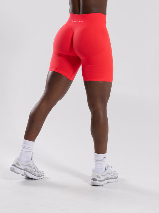 Pump Mid Rise Biker Short - Neon Red | Alphalete