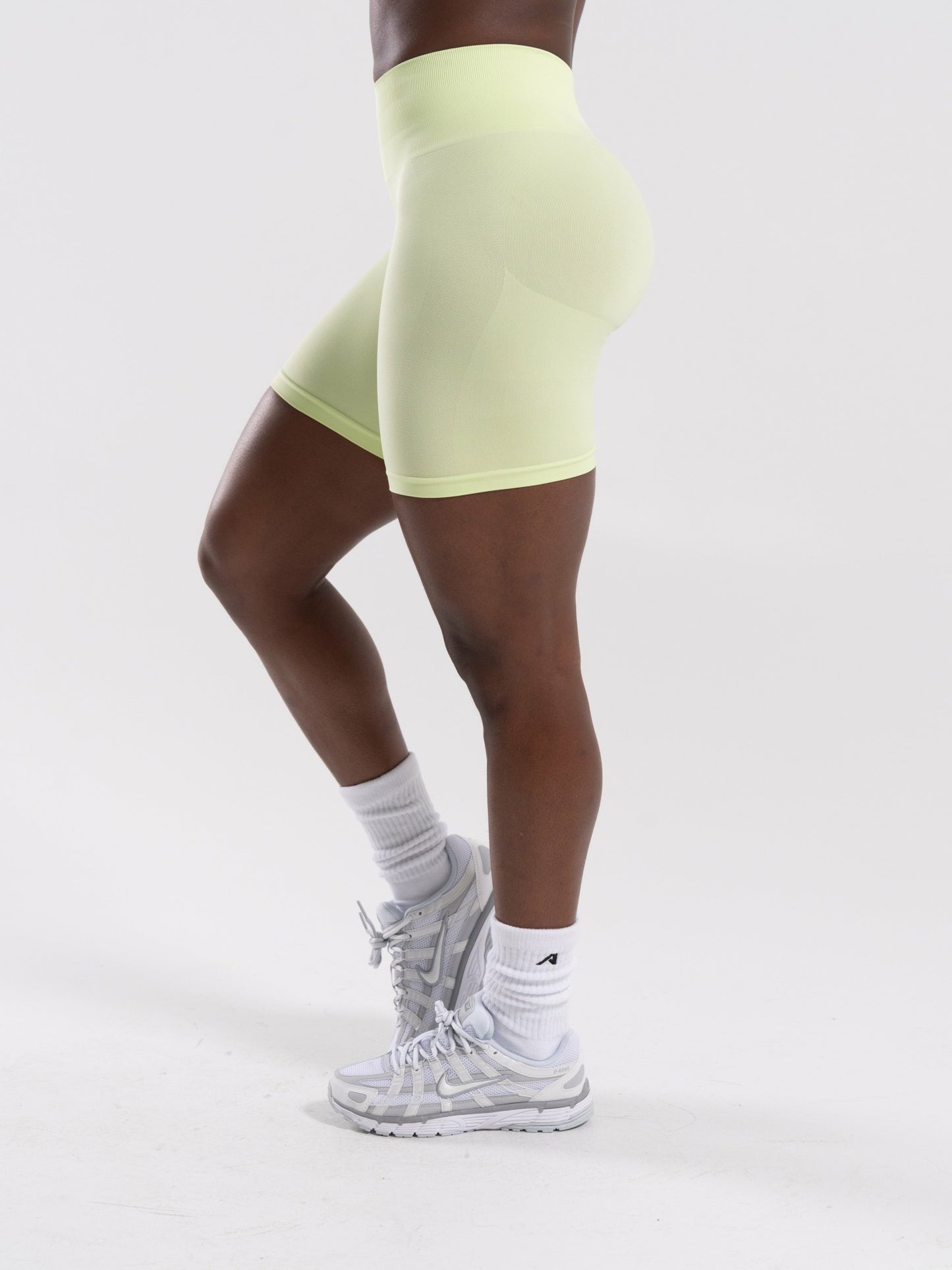 Pump Mid Rise Biker Short - Citrus Frost | Alphalete