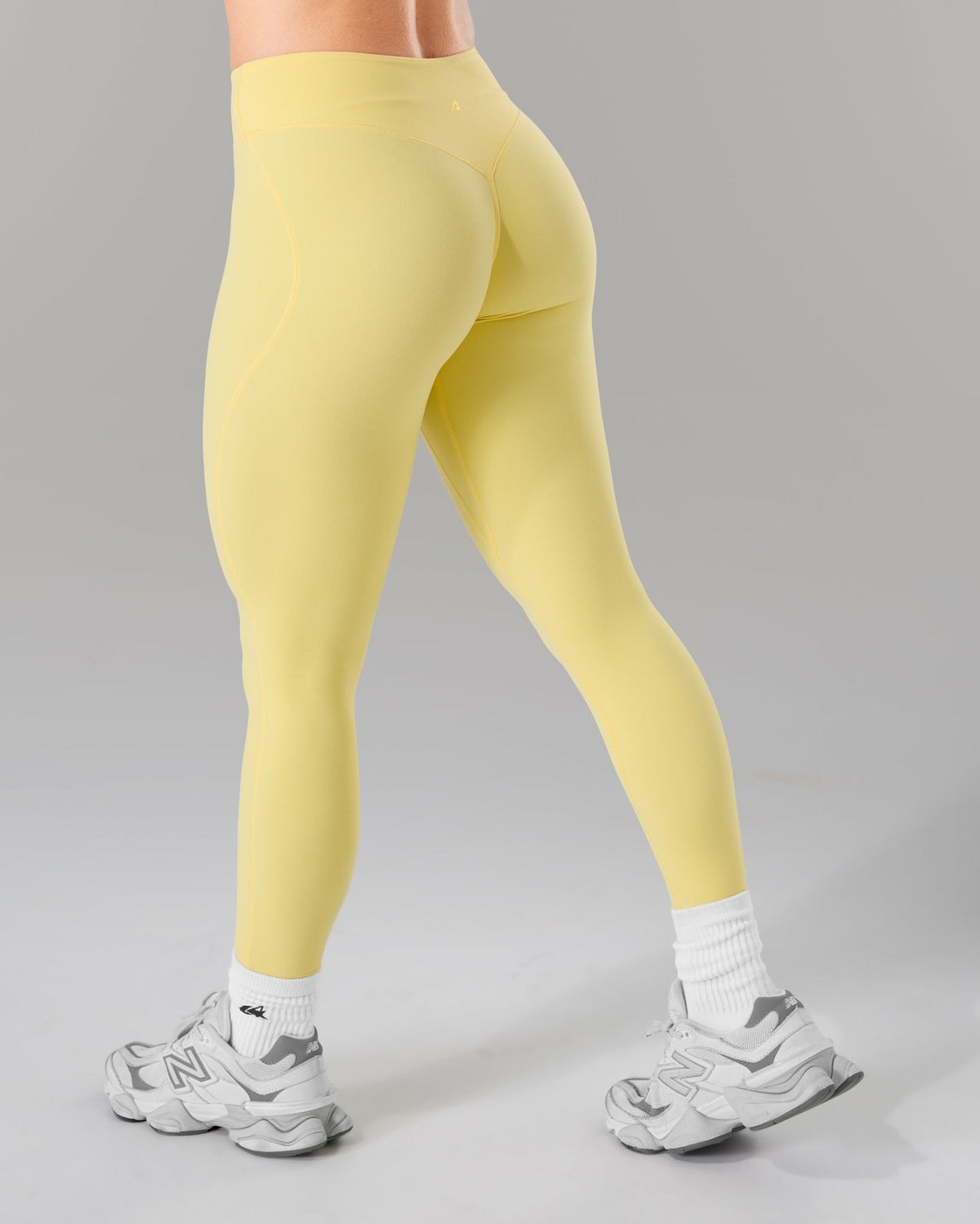 Wrap Mid Rise Legging - Canary | Alphalete