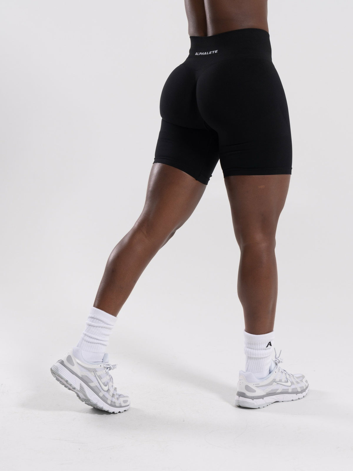 Pump Mid Rise Biker Short - Black | Alphalete