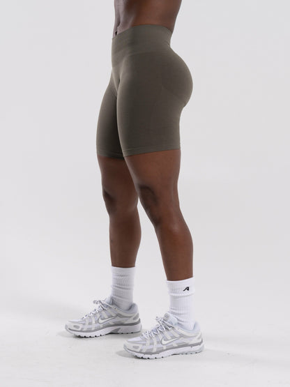 Pump Mid Rise Biker Short - Khaki | Alphalete