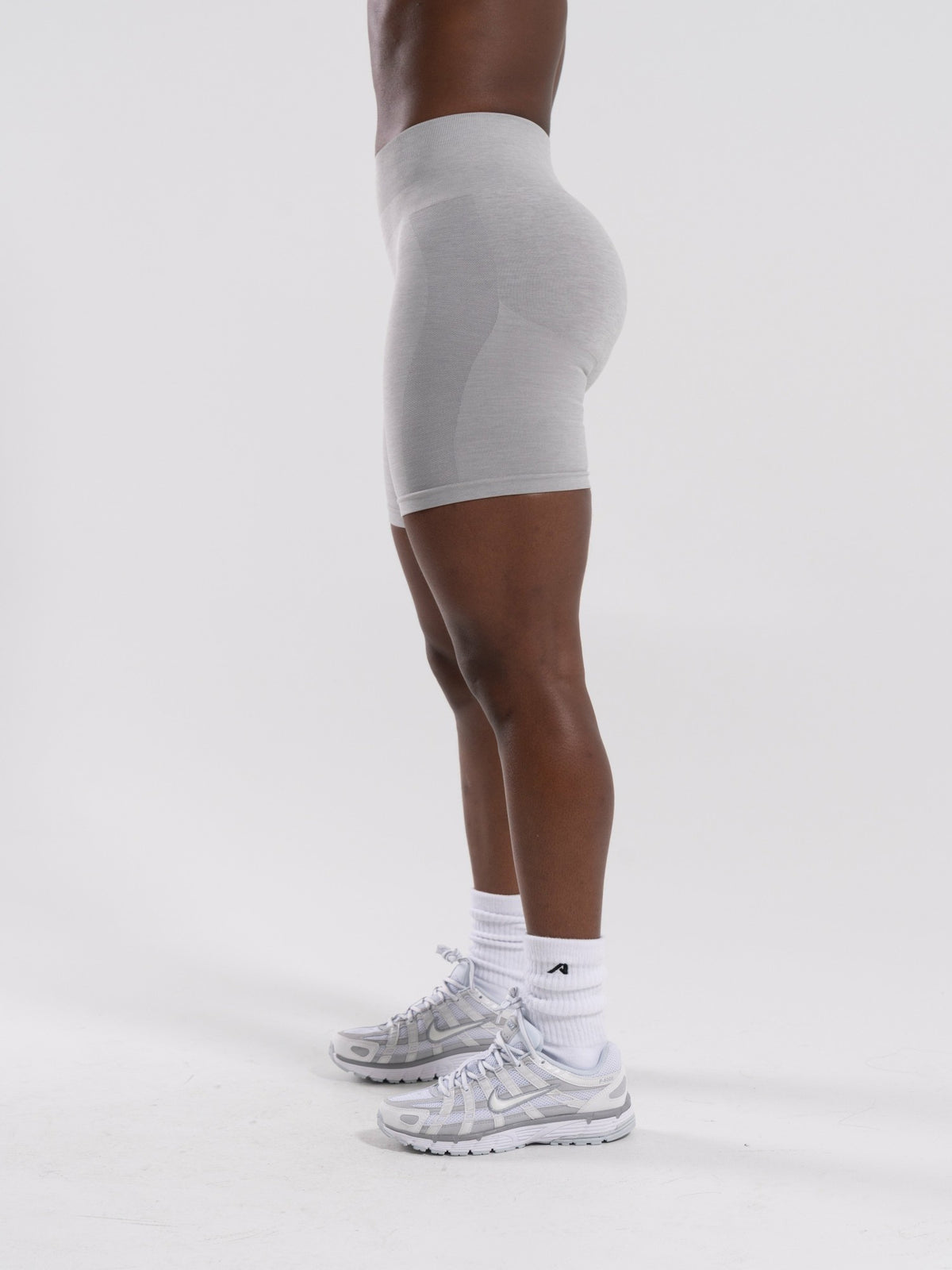 Pump Mid Rise Biker Short - LT Heather | Alphalete