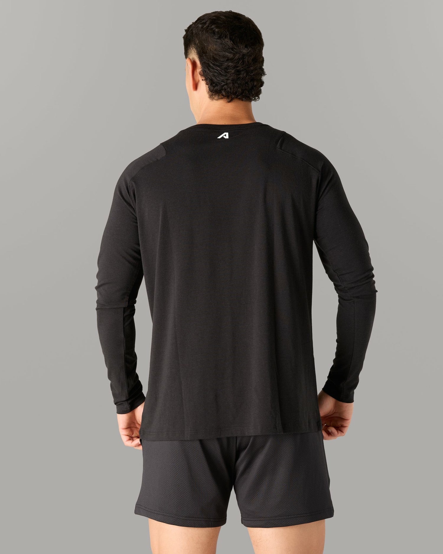 Essential LS Tee - Black - Mens Workout Tee | Alphalete
