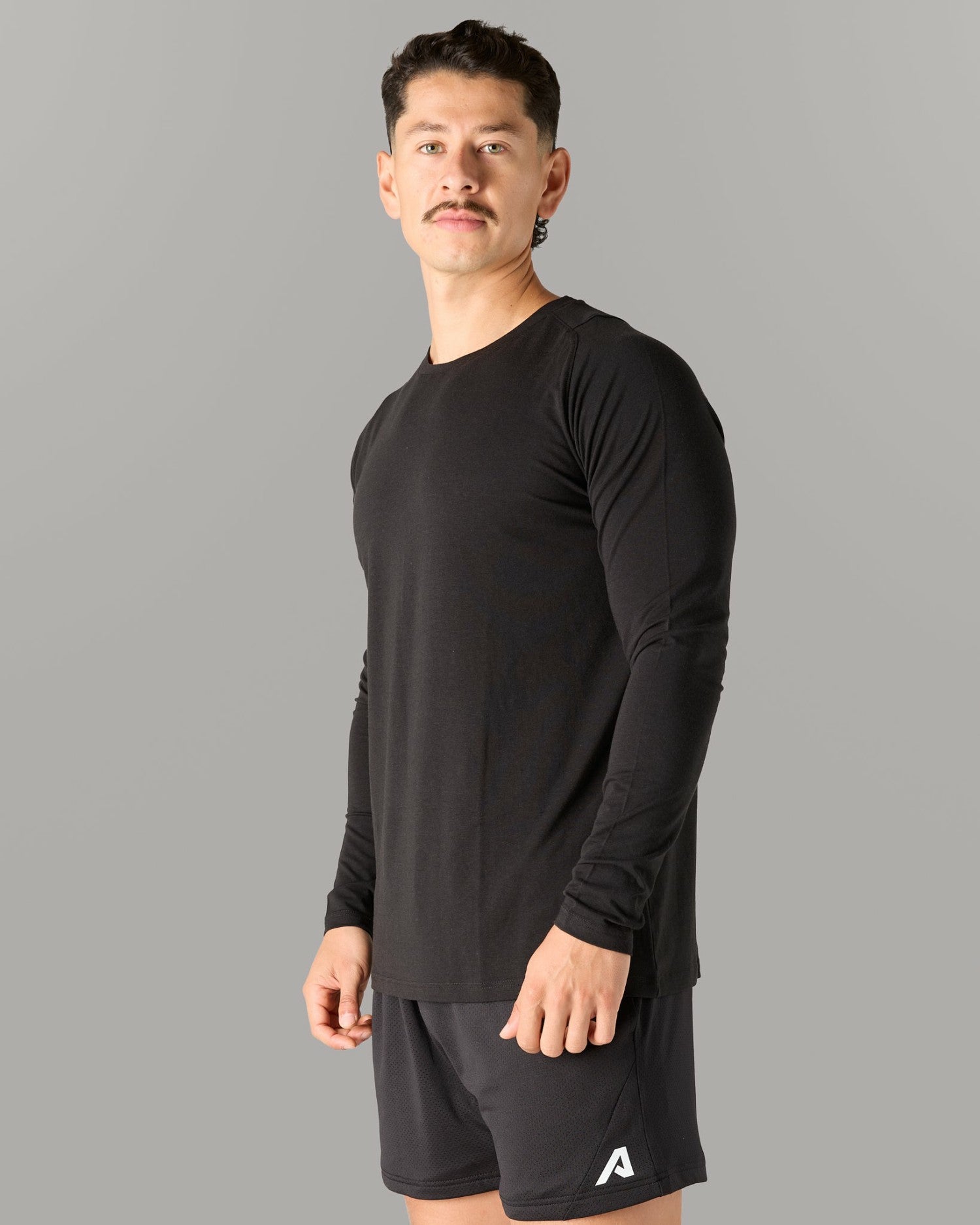 Essential LS Tee - Black - Mens Workout Tee | Alphalete