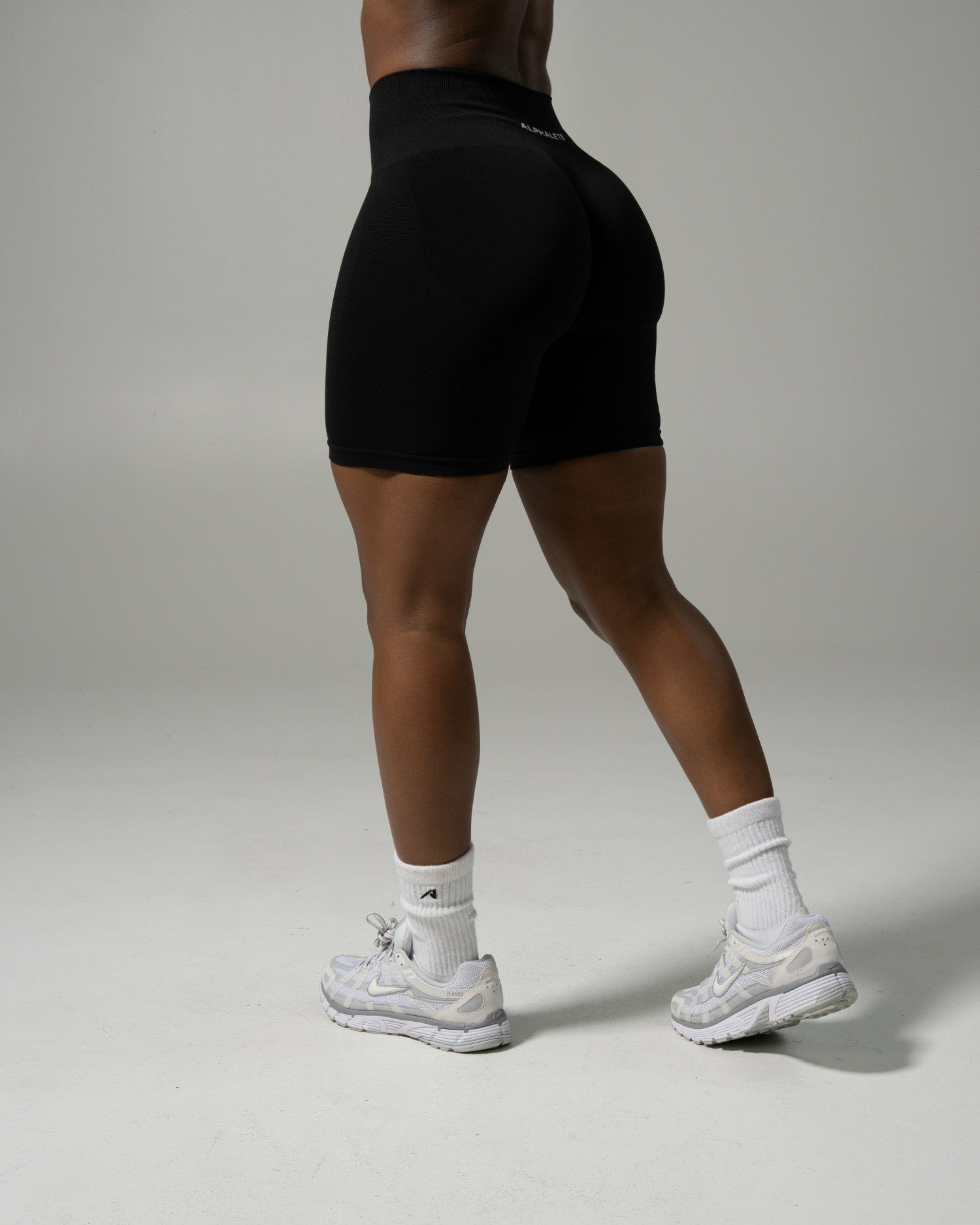 Pump Mid Rise Biker Short - Black | Alphalete