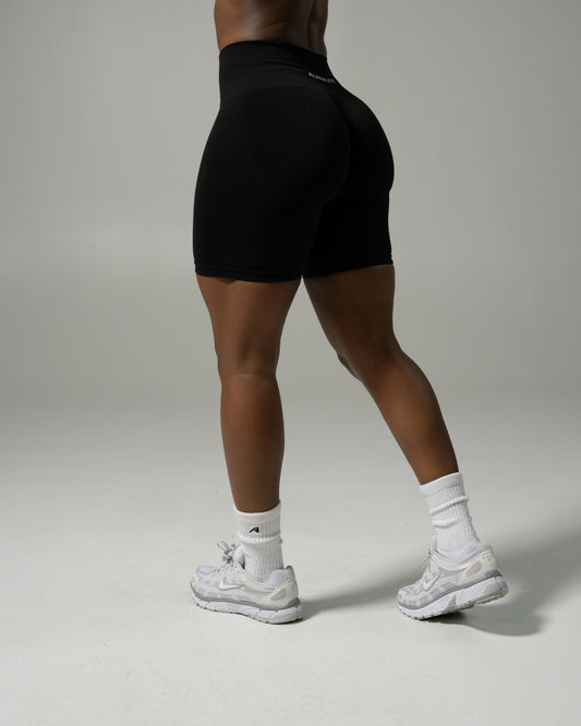 Pump Mid Rise Biker Short - Black | Alphalete