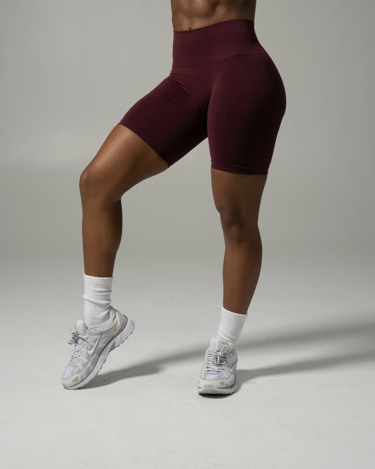 Pump Mid Rise Biker Short - Merlot | Alphalete