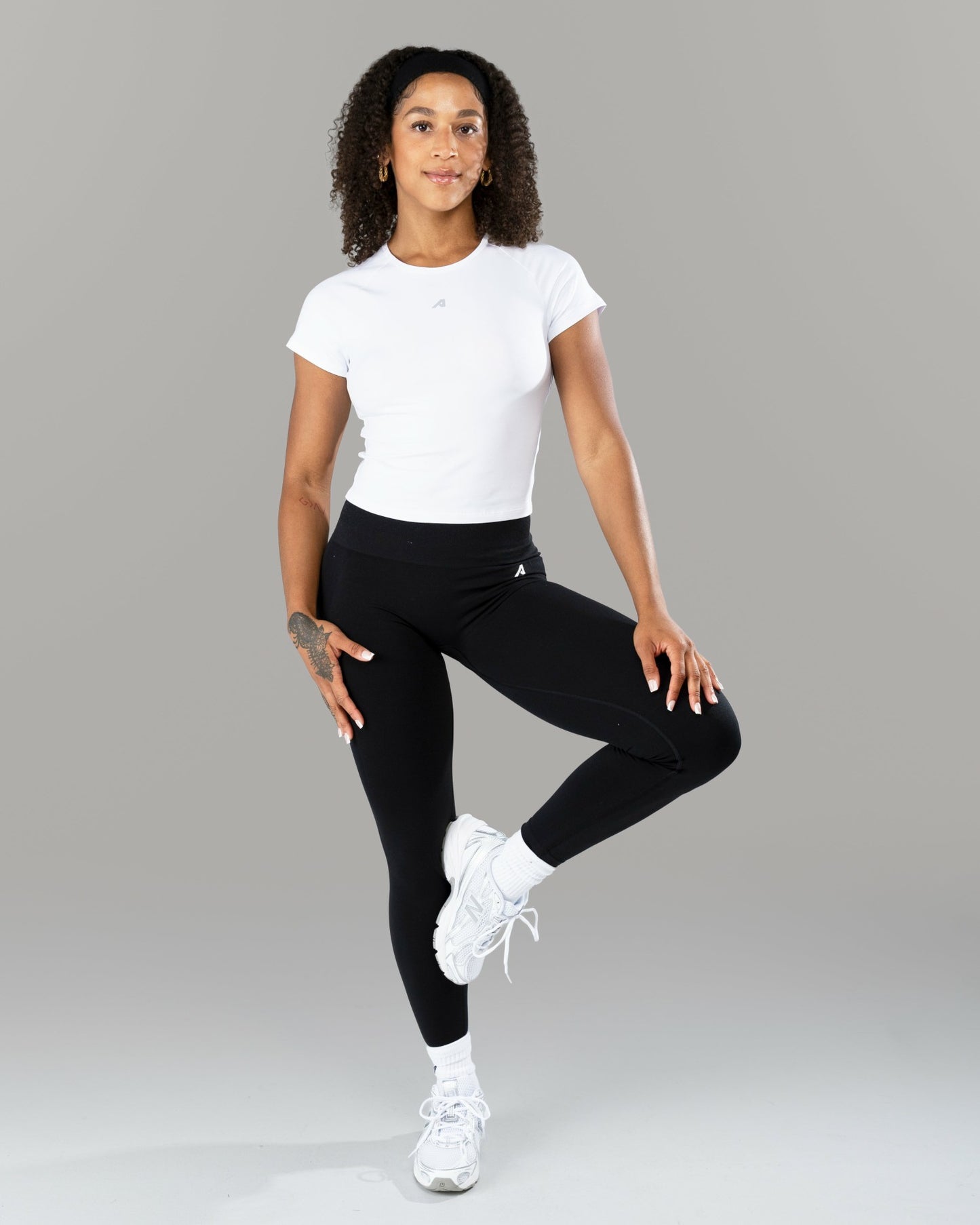 Icon Baby Tee - White - Workout Clothes For Women | Alphalete