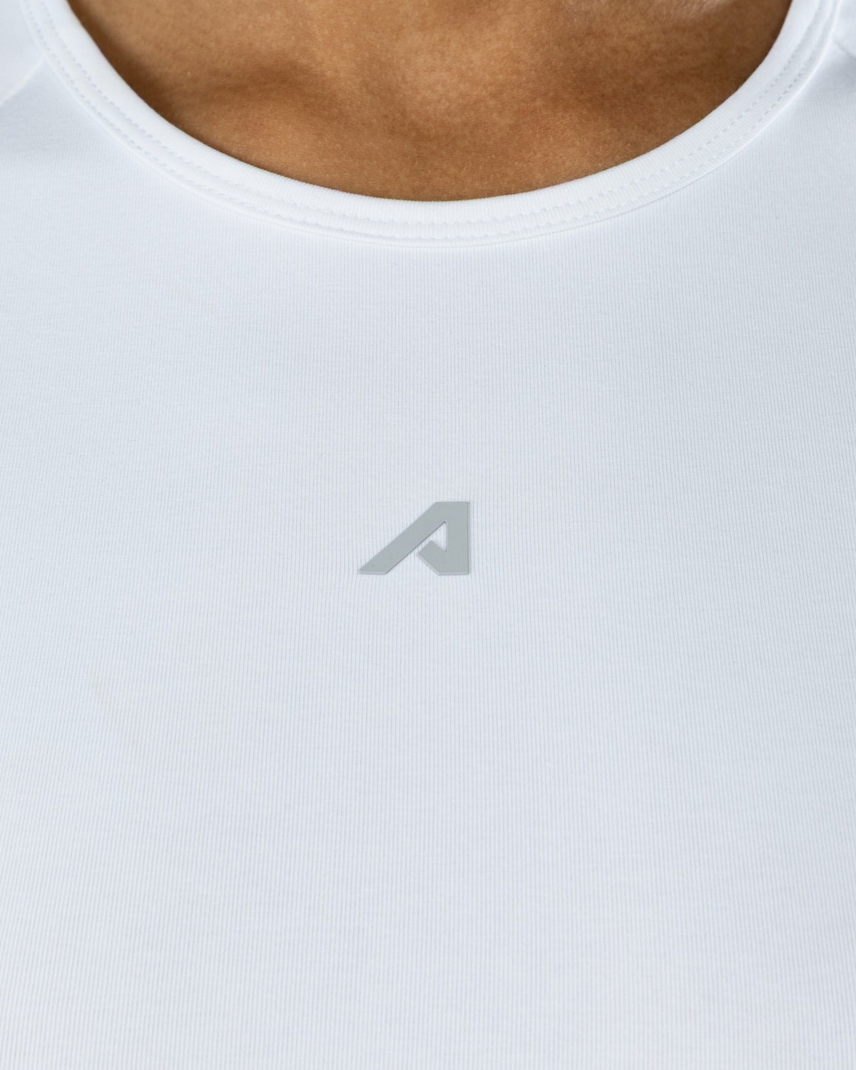 Icon Baby Tee - White - Workout Clothes For Women | Alphalete