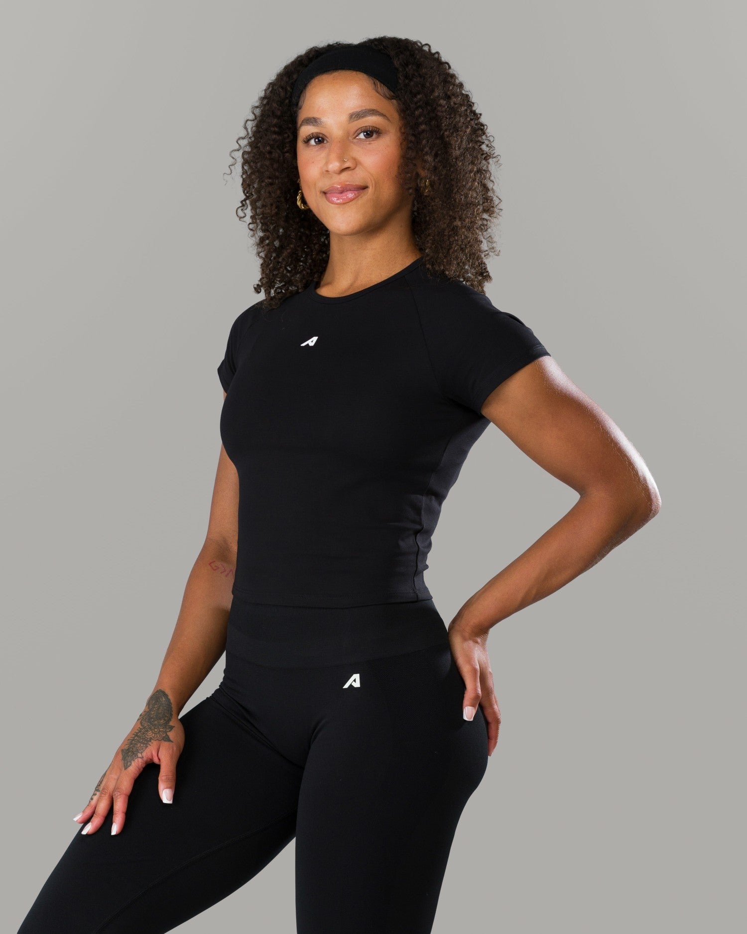 Icon Baby Tee - Black - Workout Clothes For Women | Alphalete