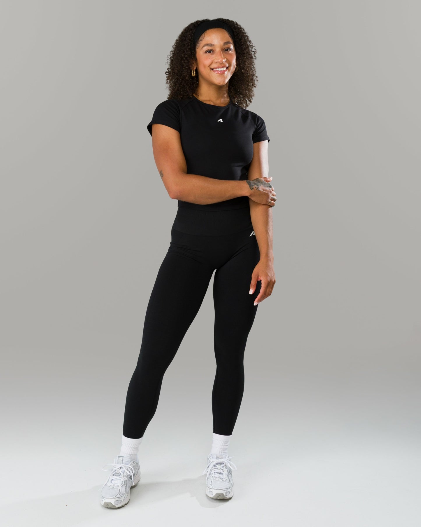 Icon Baby Tee - Black - Workout Clothes For Women | Alphalete