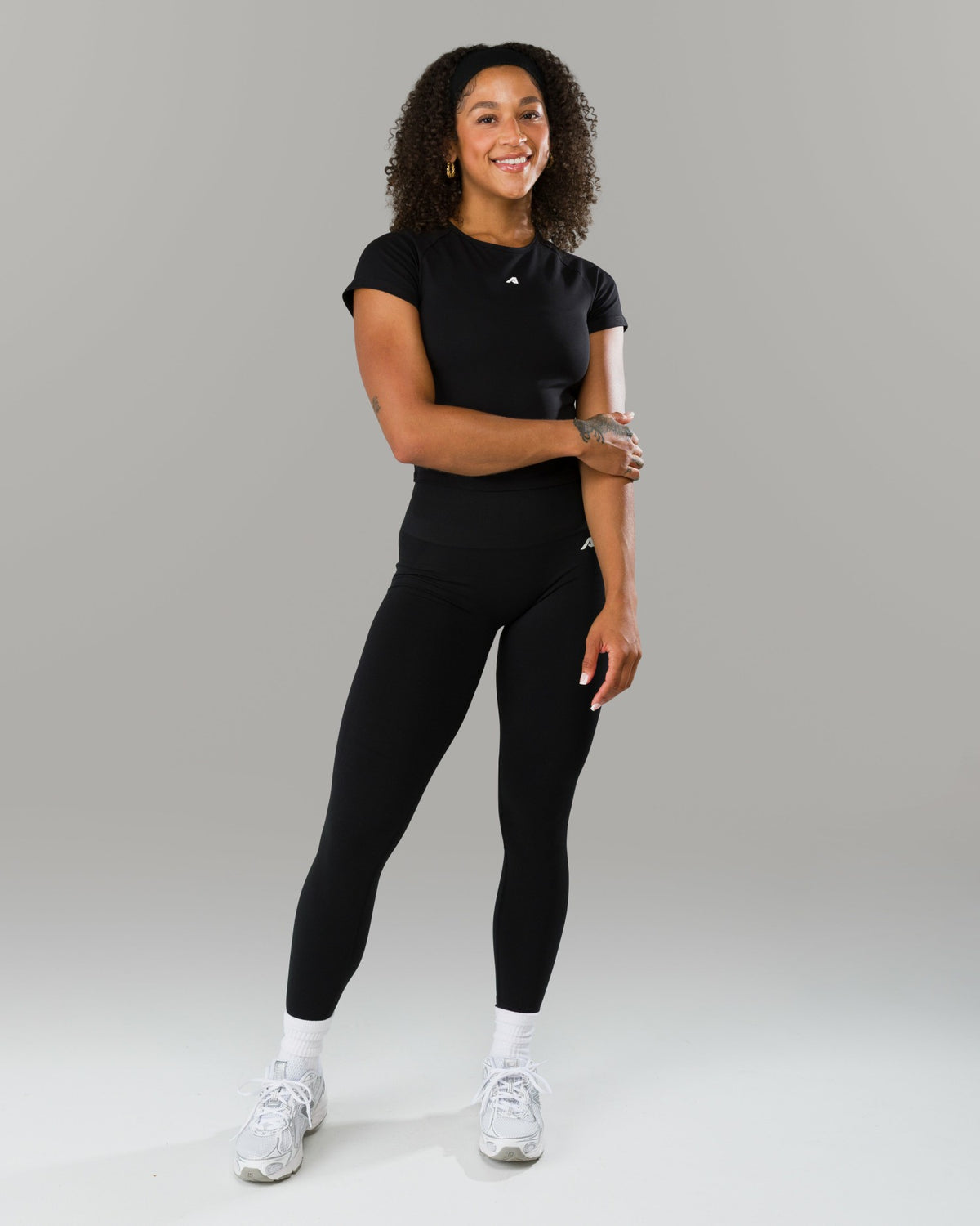 Icon Baby Tee - Black - Workout Clothes For Women | Alphalete