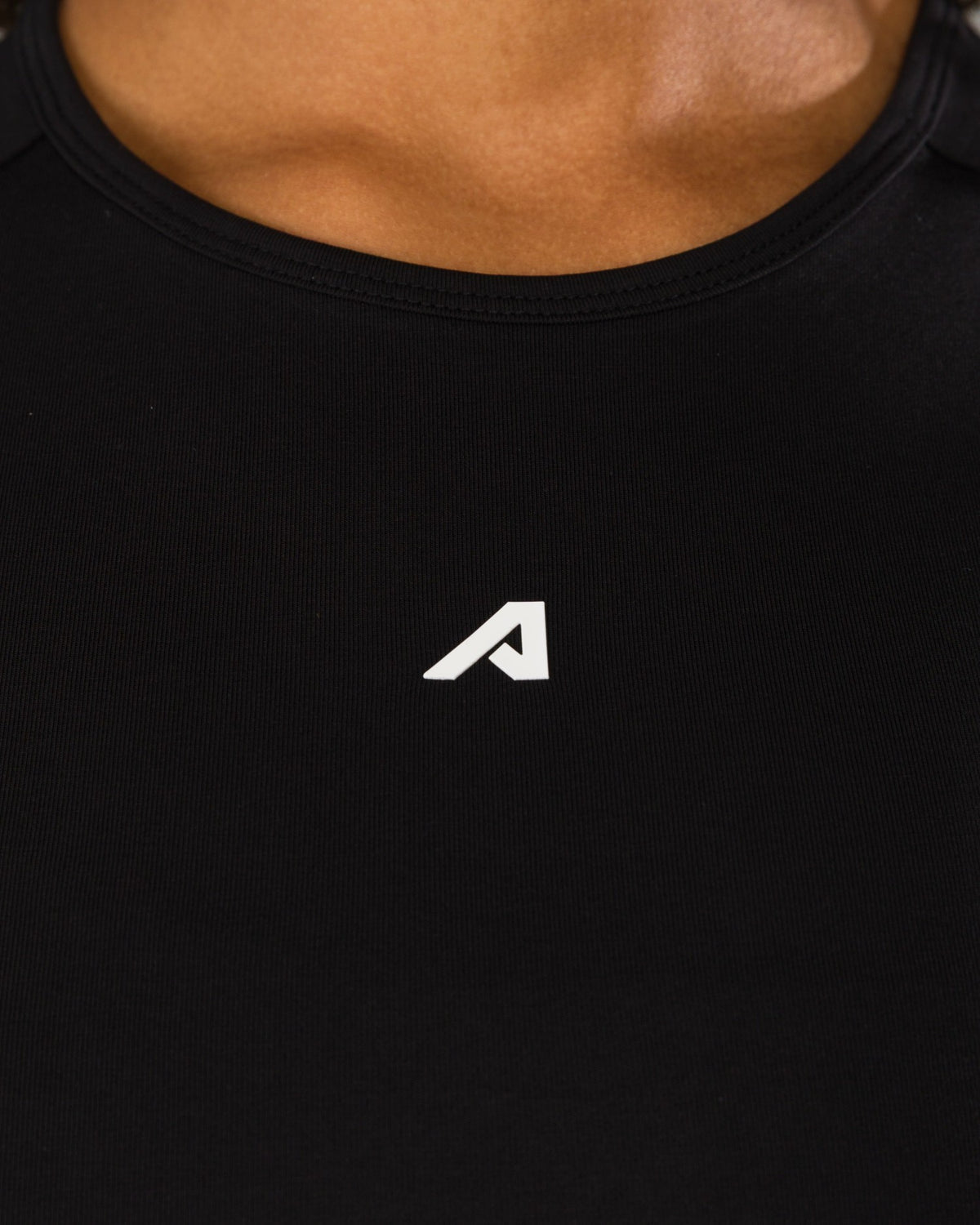 Icon Baby Tee - Black - Workout Clothes For Women | Alphalete